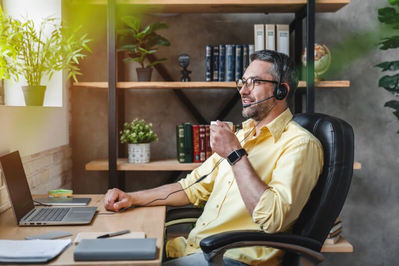 https://www.newyorkpaincare.com/wp-content/uploads/2021/06/Man-in-headset-having-break-and-drinking-coffee-while-working-at-home.jpg