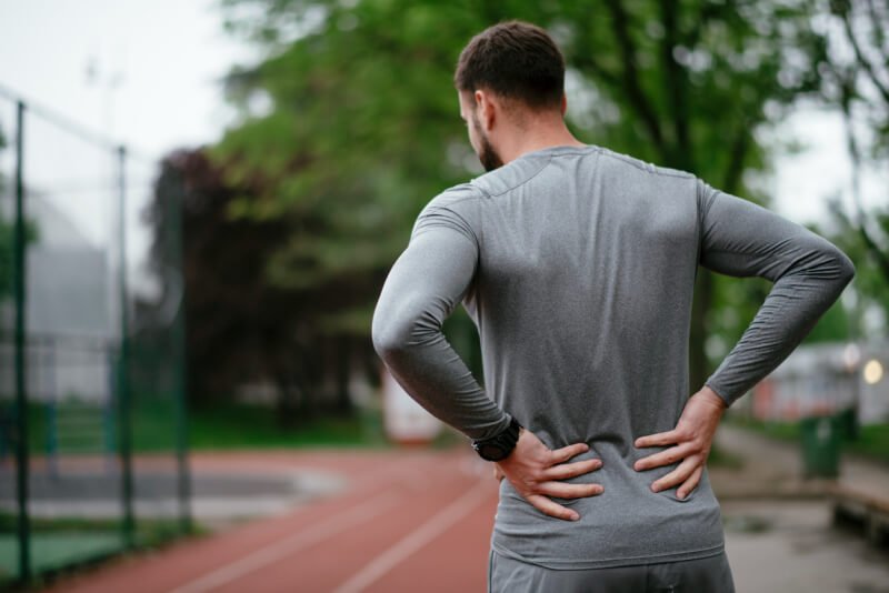 what causes the back of your legs to hurt